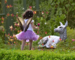 Fawn statue at Glenveagh Castle being visited by a "fairy."
